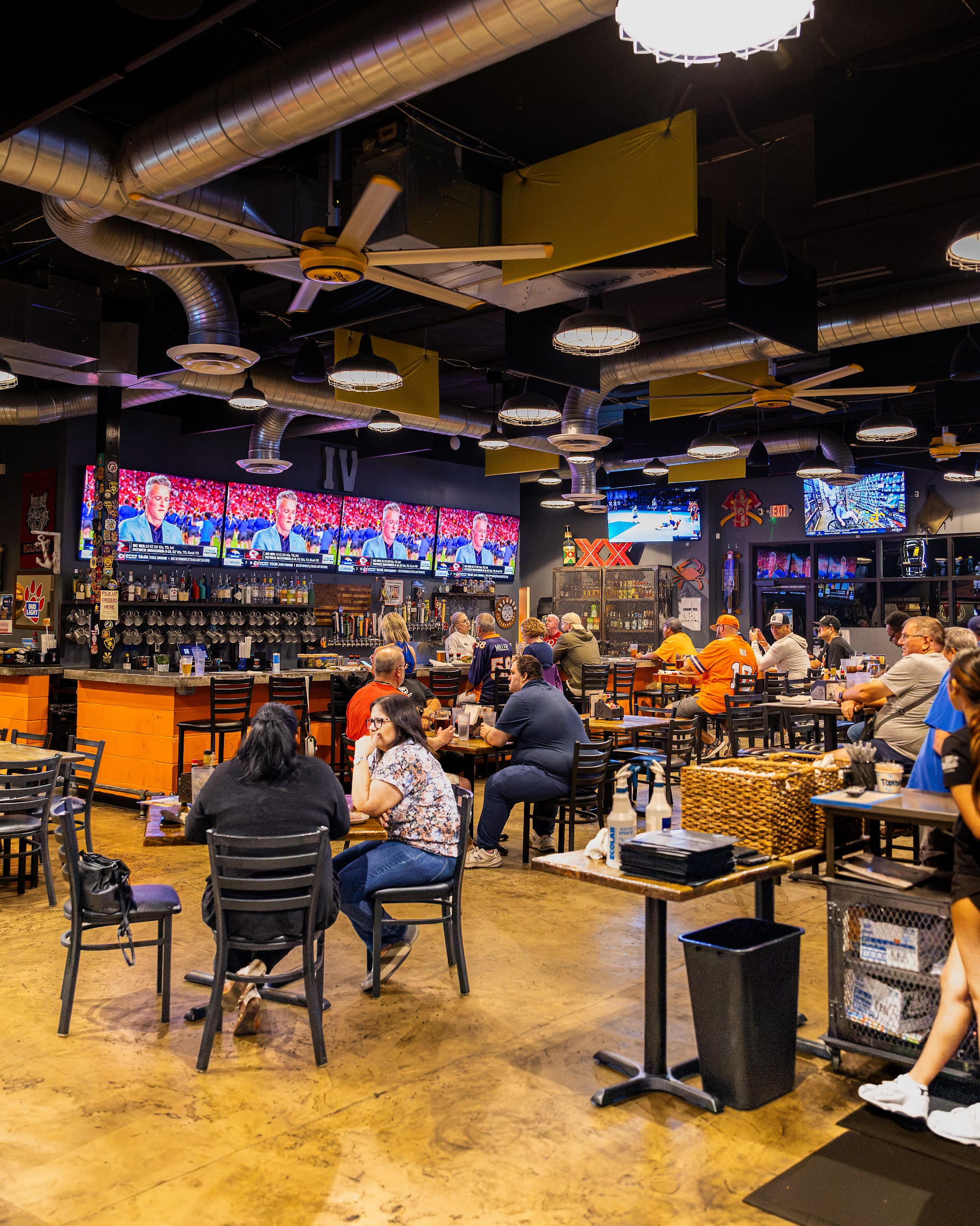Inside Trident IV with game day on every screen