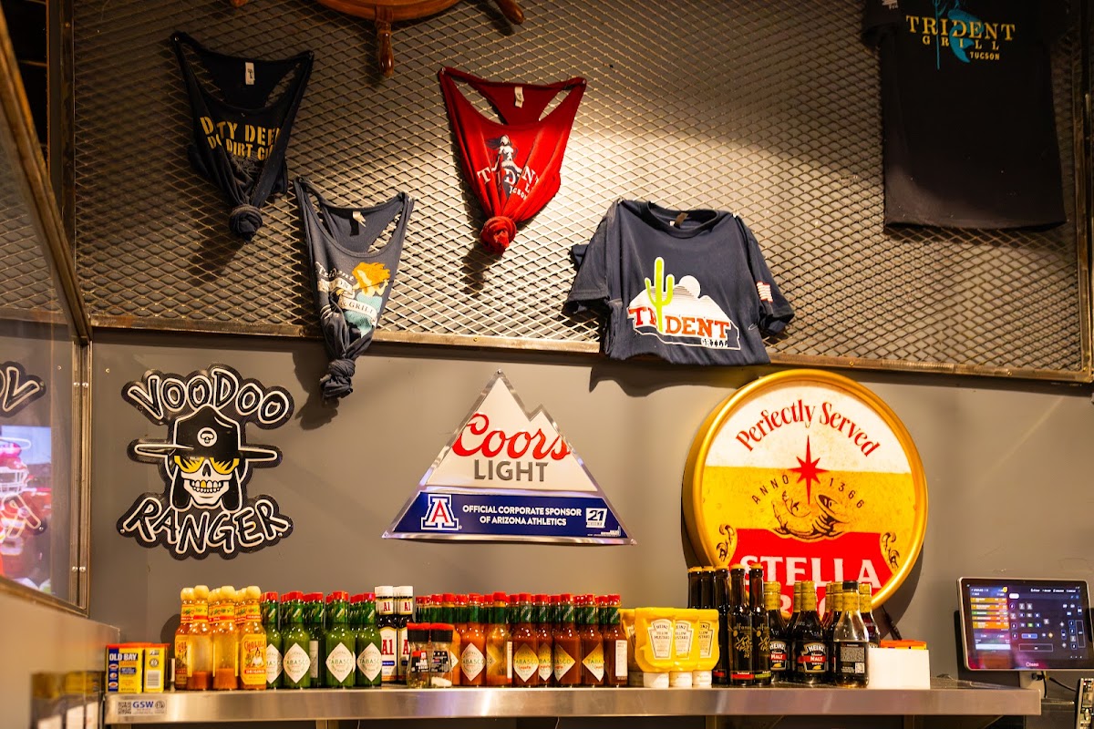 Jerseys and beer signs on the wall at Trident IV
